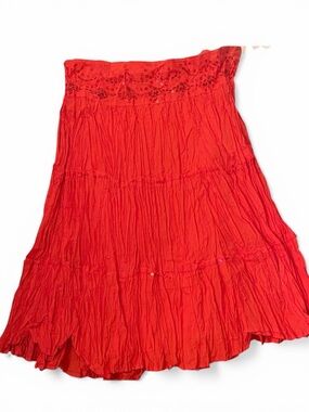 New With Tags Younique Salmon Sorbet Flirty Skirt with Beading Detail waist. M.